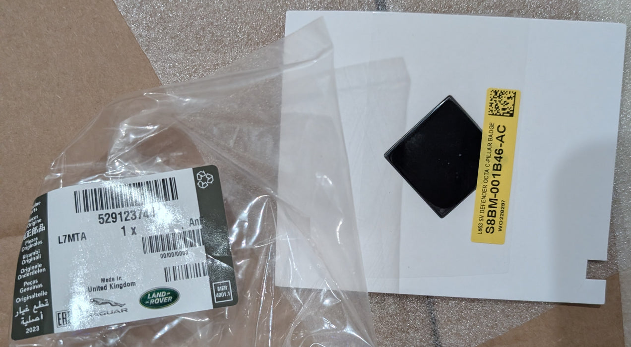 Land Rover OEM L663 Defender OCTA Black & Chrome Side Badge Brand New
